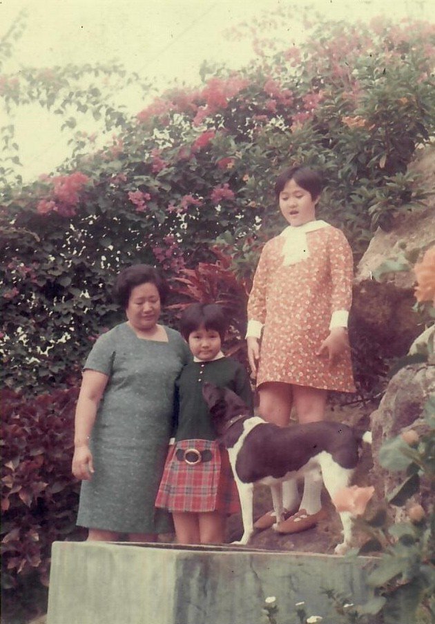 Architect Annie Chu childhood photo with sister, mother, and dog