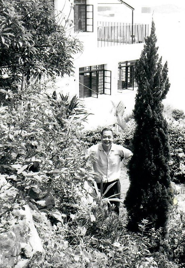 Architect Annie Chu's father standing in his garden