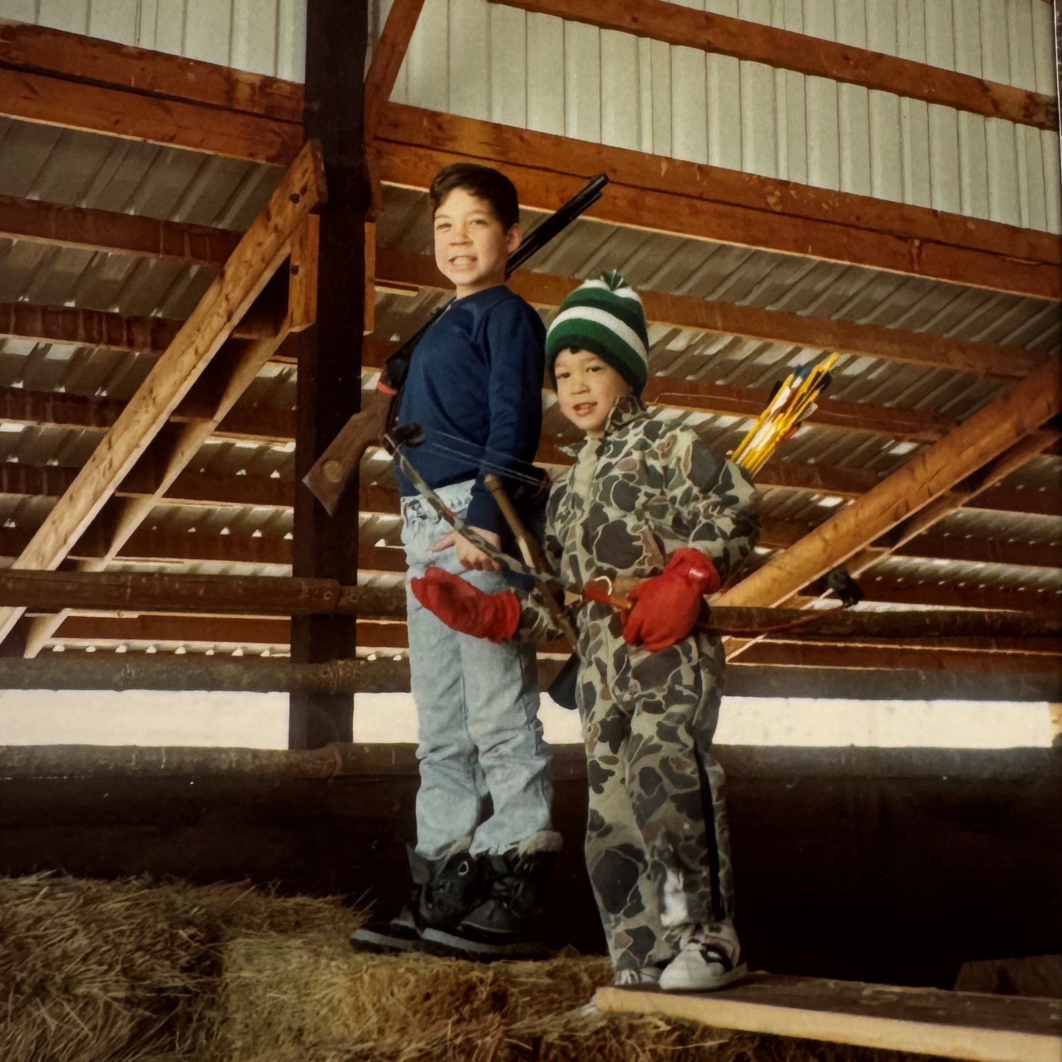 Childhood photo of Joe Dangaran and younger brother in hay barn