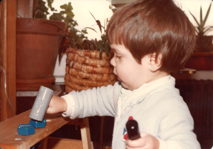Jonathan Nesci playing with his first tool set as a child