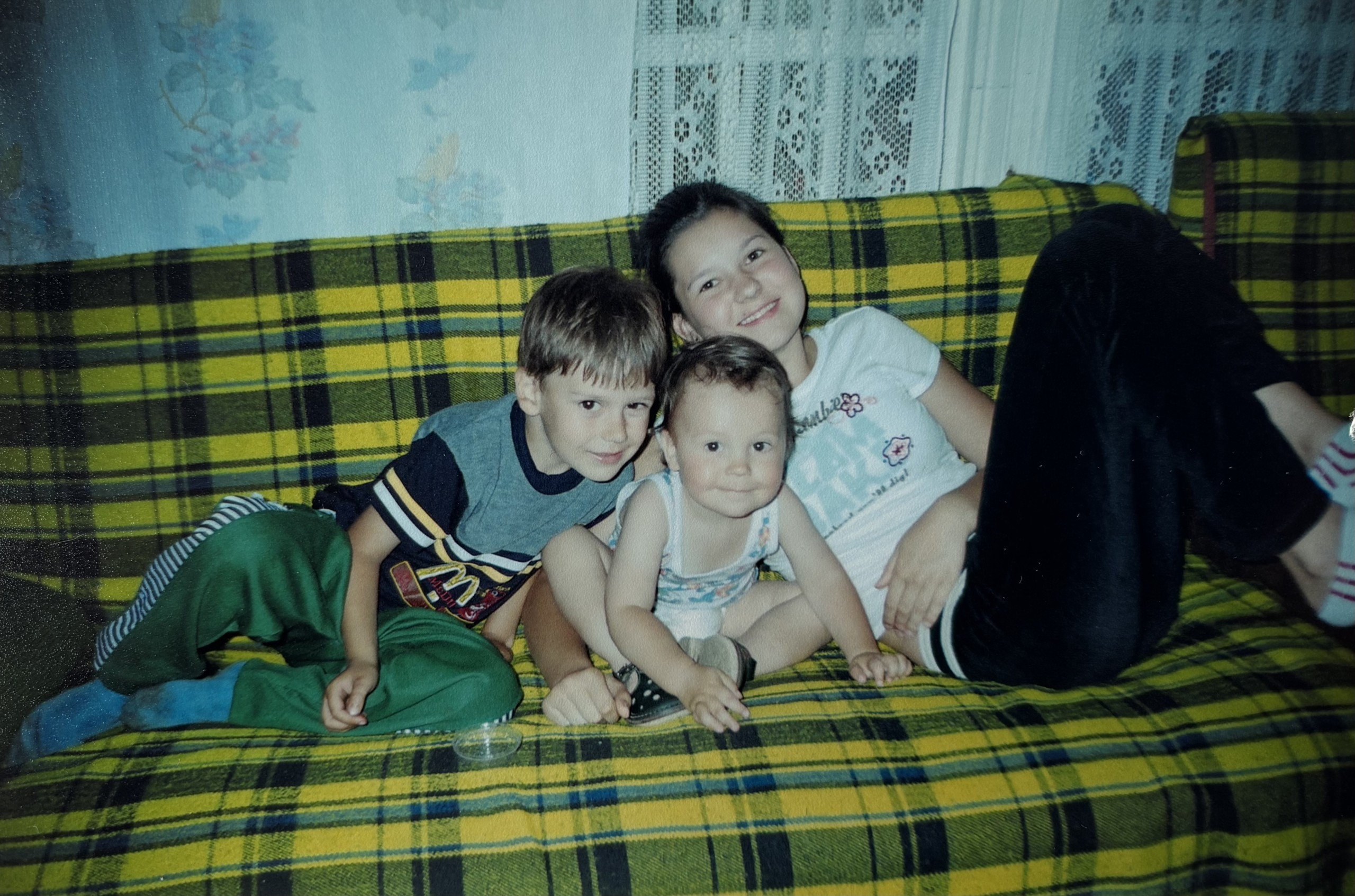 Julia Gamolina brother and cousin childhood photo