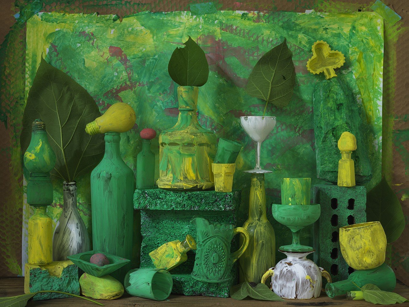 Many green objects in a photograph from Chris and Nino Mottalini's “Nino + Dad (Home Studies)”