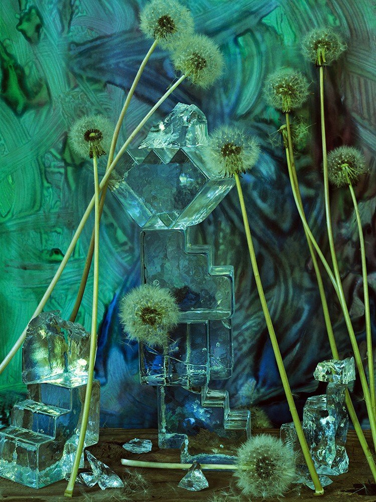 Blue-green objects in photograph by Chris and Nino Mottalini from “Nino + Dad (Home Studies)”