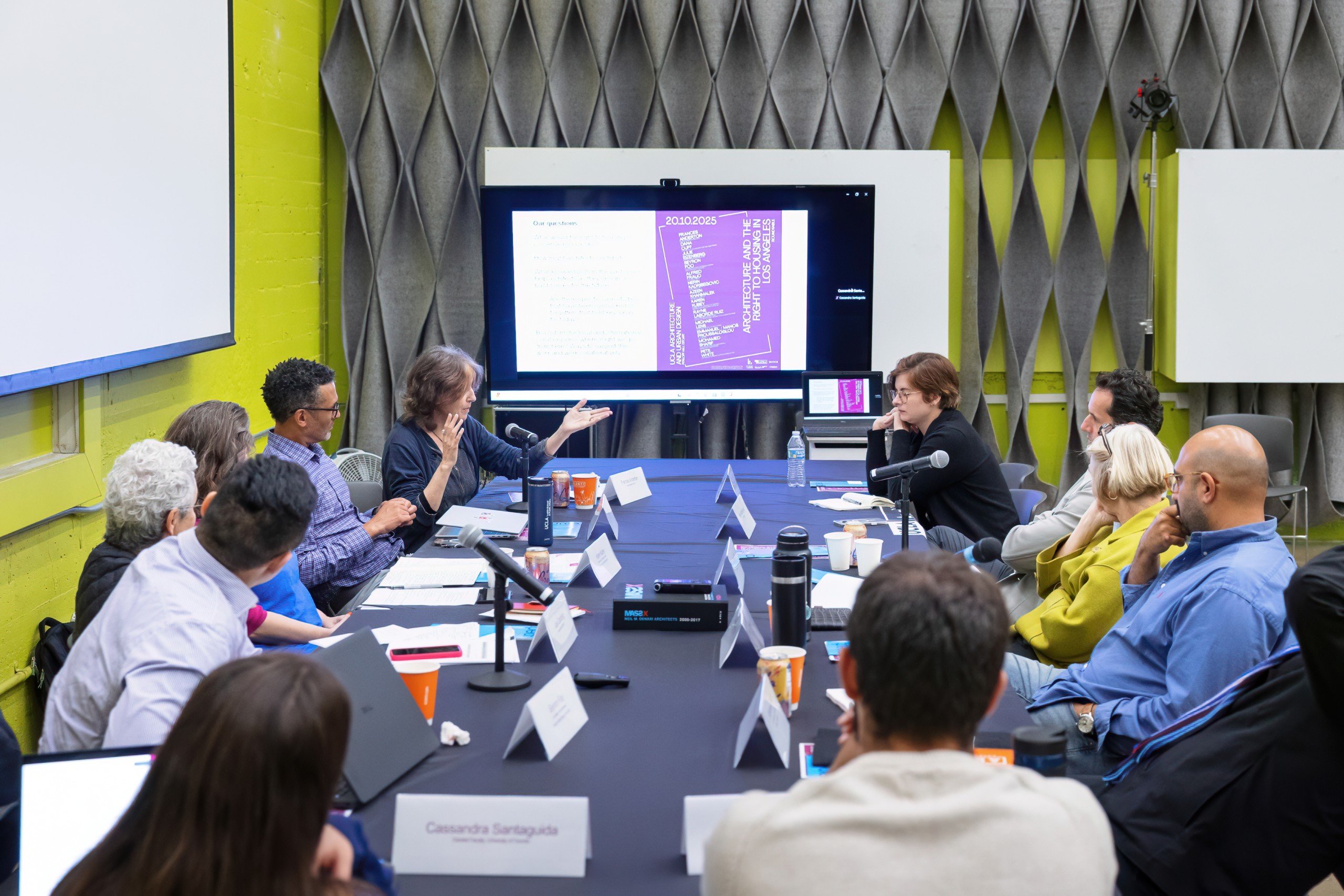 People sitting around conference table for the Los Angeles iteration of Architecture and the Right to Housing roundtable discussion