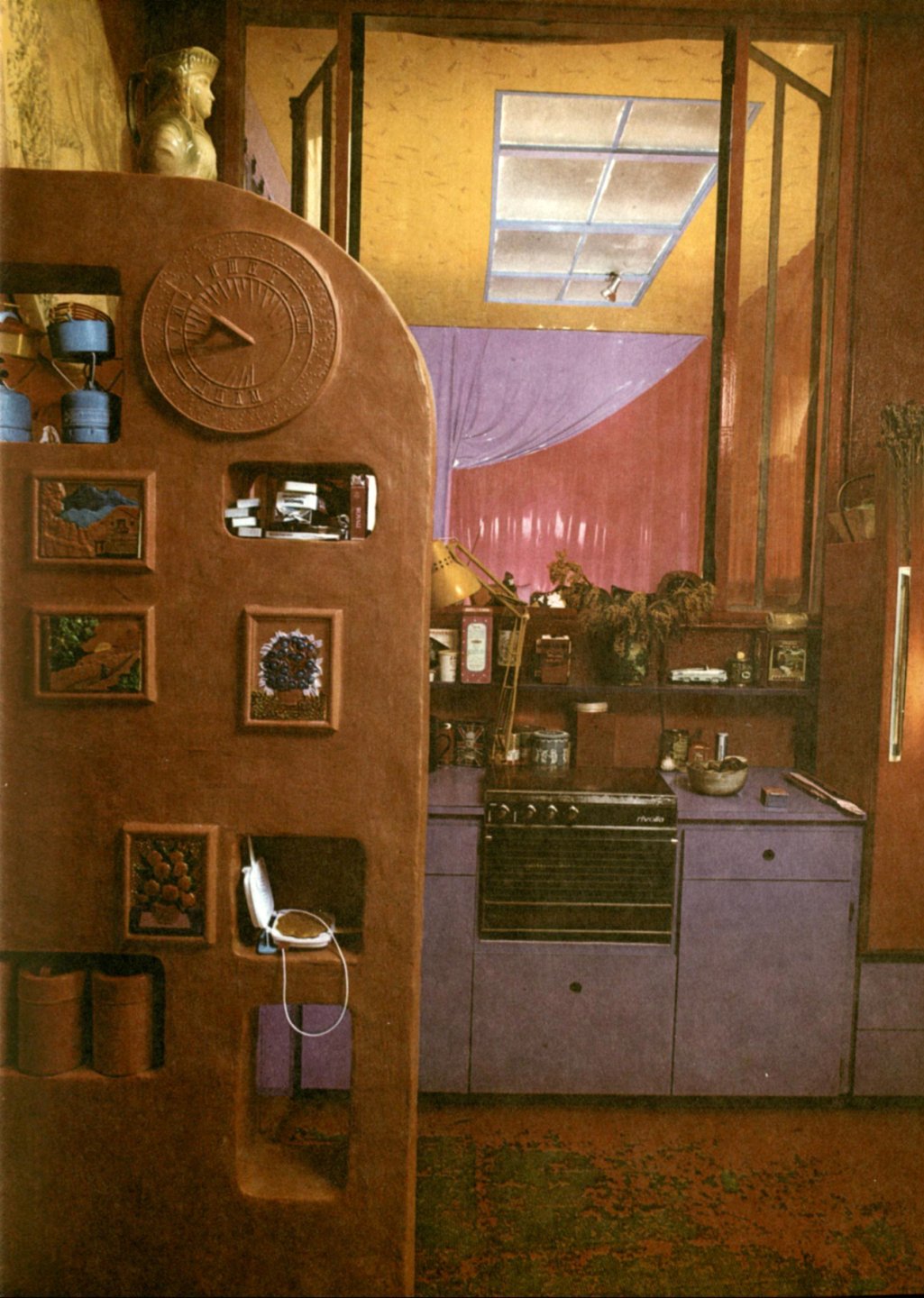 Vintage image of a colorful purple and wooden kitchen from a page in in the book Underground Interiors.