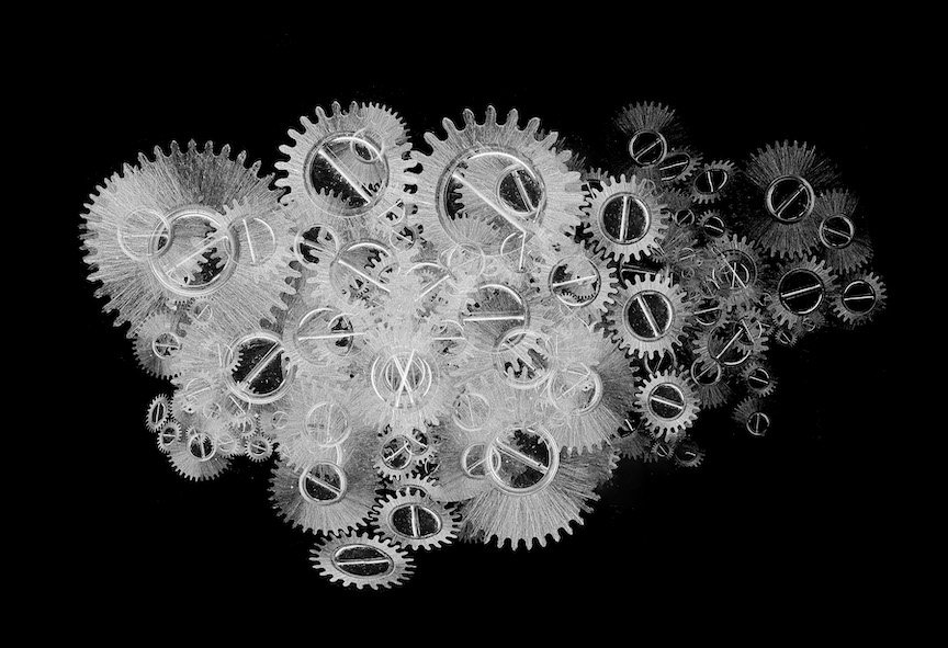 Black and white spokes of wheels interconnected